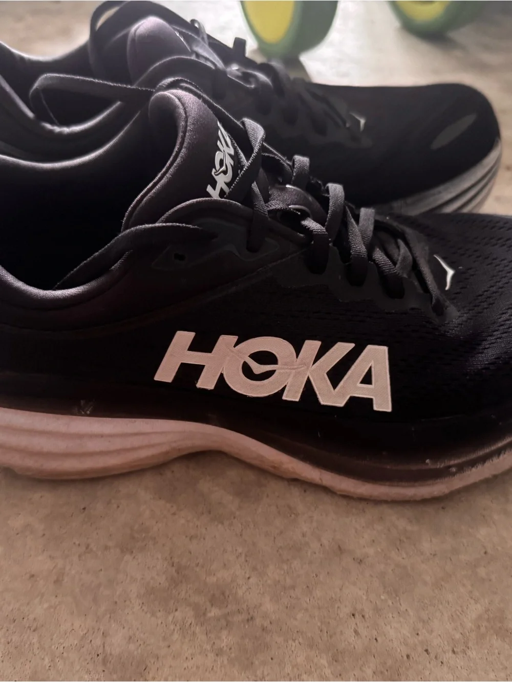 Hoka Men’s Black and White Athletic Running Shoe